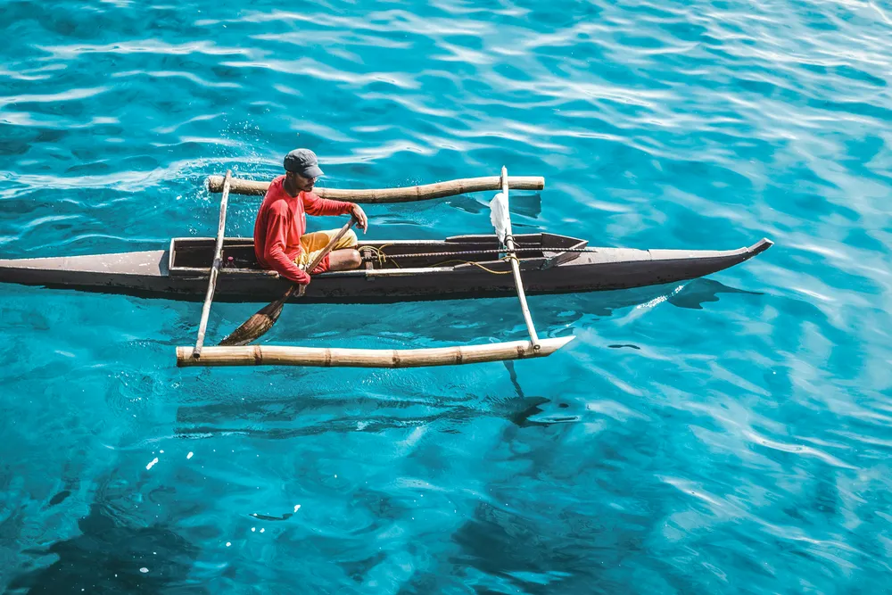 Local fisherman in Bangka boat near Cebu, Philippines. Photo by Hector John Periquin